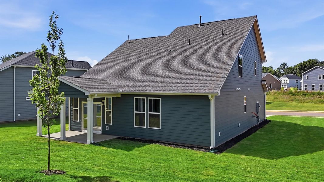 Exterior details and patio area of a home in Creeks at Midway, Anderson (Image 3).