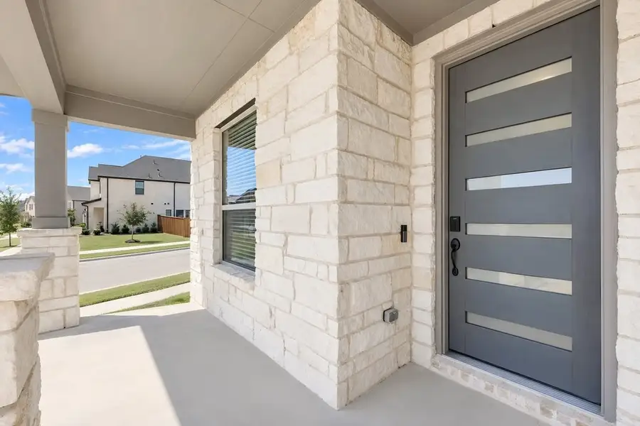 Exterior details and patio area of a home in Cross Creek Meadows, Celina (Image 21).