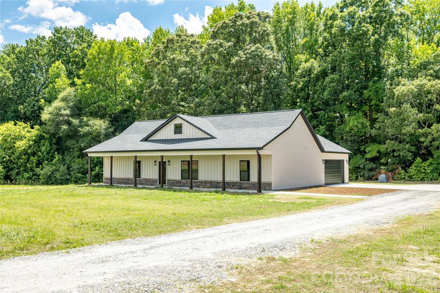 Front exterior of a new home in , Clover, SC, highlighting curb appeal (Image 17). Front exterior of a new home in , Clover, SC, highlighting curb appeal (Image 17).