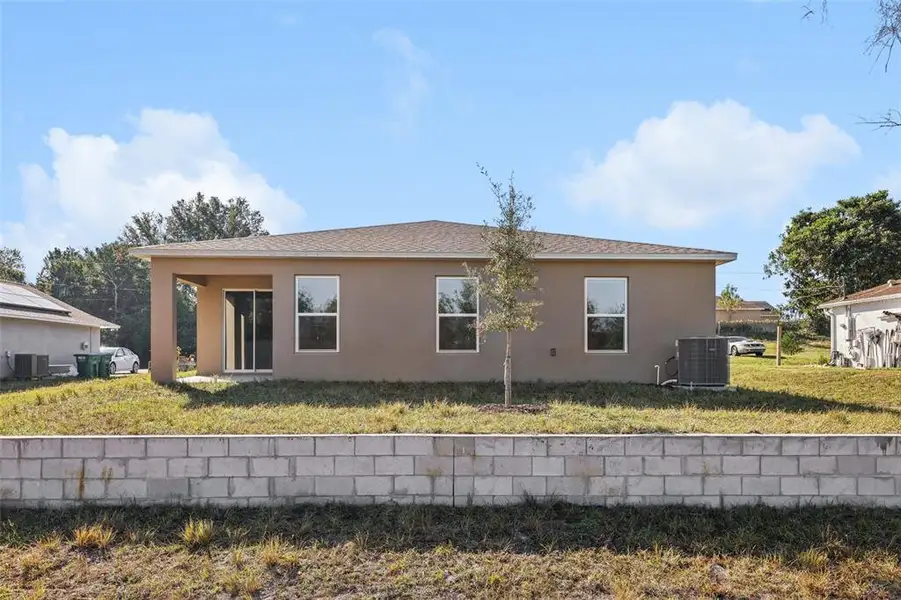 Exterior details and patio area of a home in Deltona Classic, Deltona (Image 8). Exterior details and patio area of a home in Deltona Classic, Deltona (Image 8).