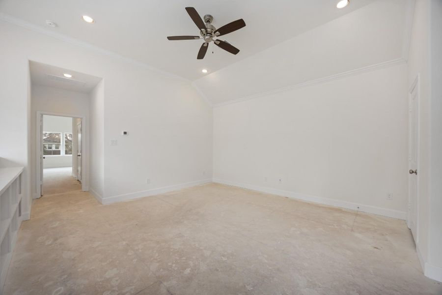 Perched at the top of the stairs, this upstairs lounge is a choose-your-own-adventure space—cozy TV den, home office, or creative corner. The vibe? Totally relaxed.