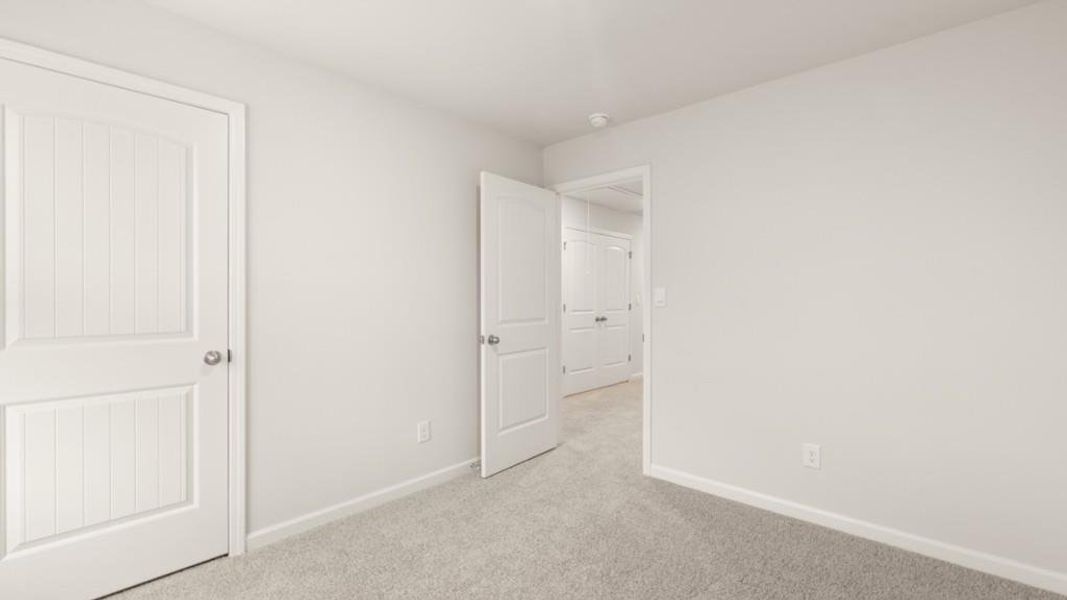 Spacious, unfurnished interior of a new home in Carlton, Douglasville (Image 19).