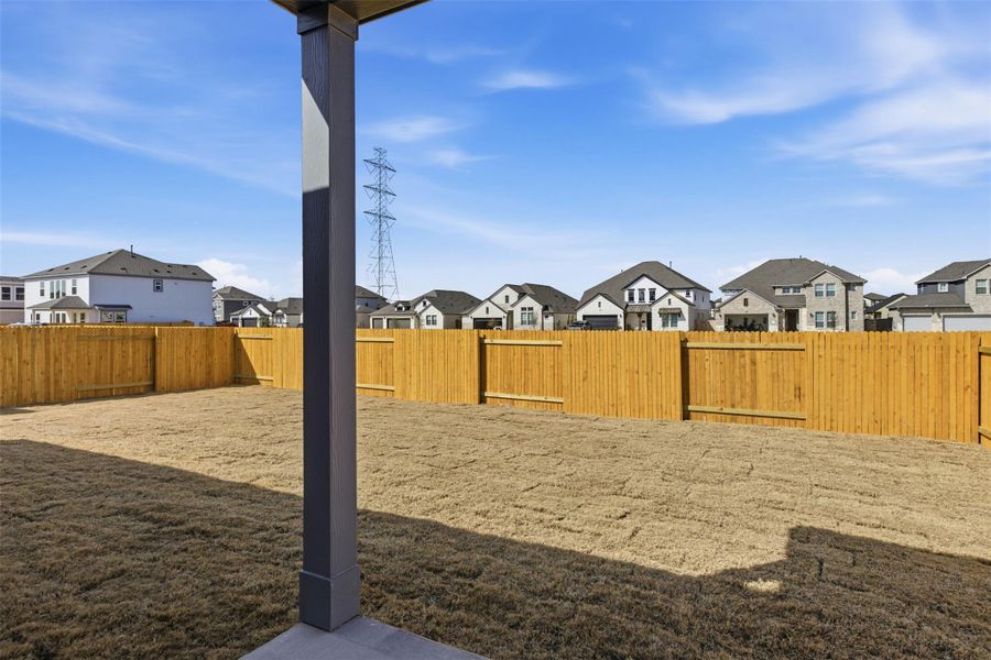 Exterior details and patio area of a home in Enclave at Cele, Pflugerville (Image 3).