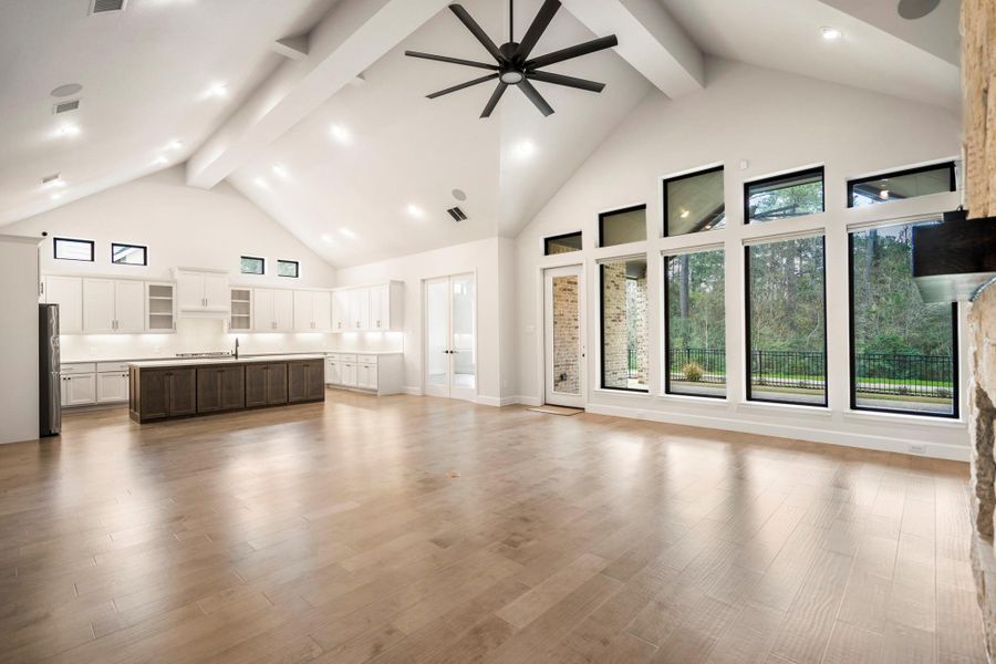 This expansive open concept floorplan offers picturesque views and abundant natural light.