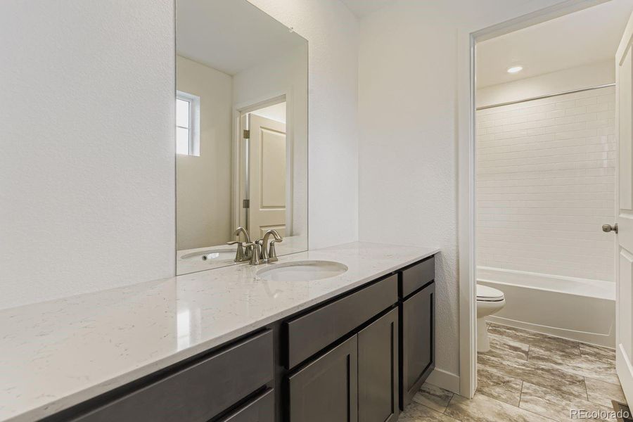 Furnished interior view inside a new home in , Centennial (Image 5).