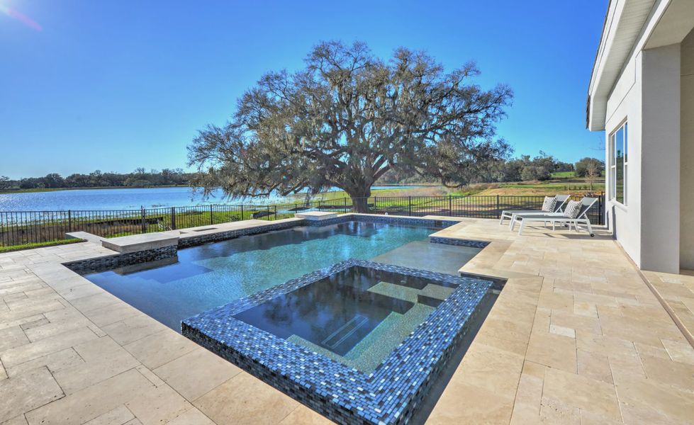 Exterior details and patio area of a home in West Hill Estates, Dade City (Image 31).