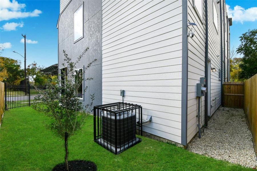 Exterior details and patio area of a home in , Houston (Image 3).