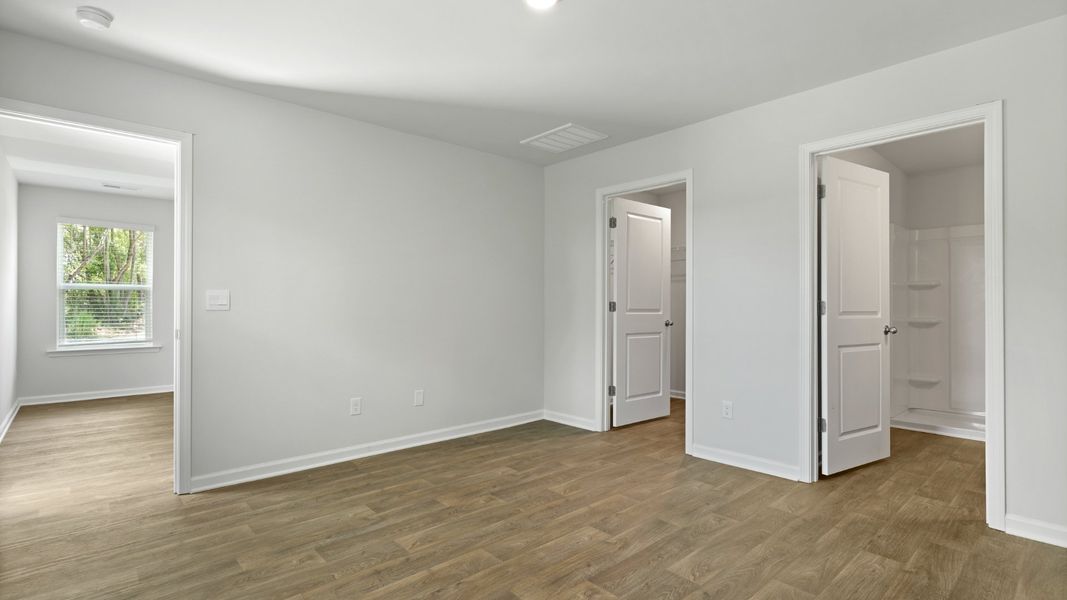 Spacious, unfurnished interior of a new home in Pine Hills at Cane Bay, Summerville (Image 21).