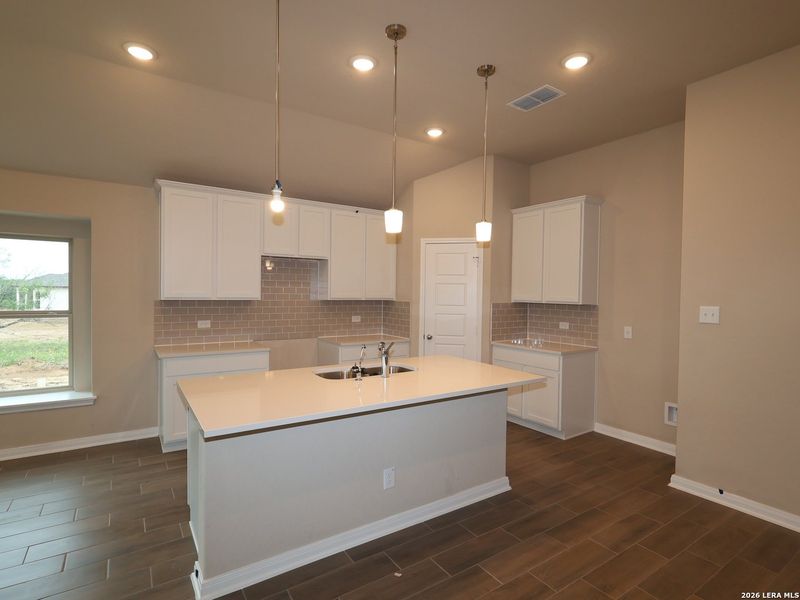 Furnished interior view inside a new home in Chaparral Ranch, Floresville (Image 5).