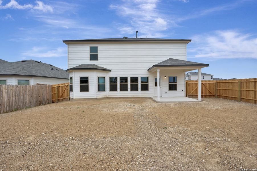 Exterior details and patio area of a home in Winding Brook, San Antonio (Image 26).