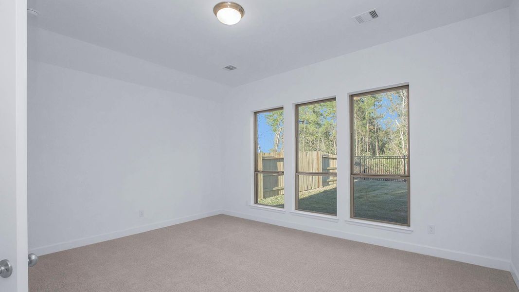 Spacious, unfurnished interior of a new home in Grand Central Park, Conroe (Image 13).