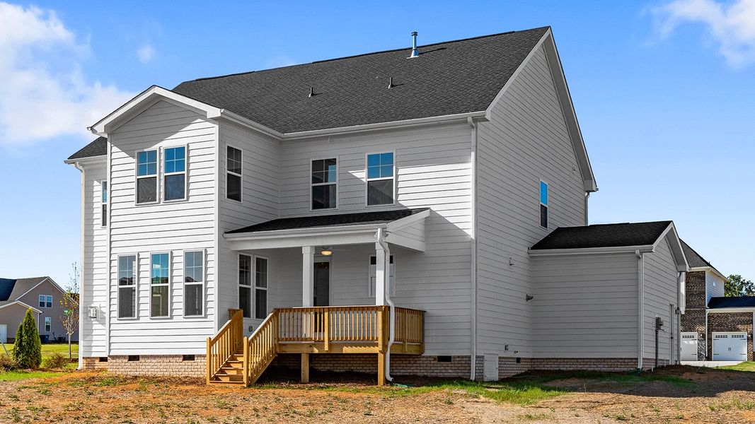 Exterior details and patio area of a home in Lilah Grove, Summerfield (Image 4).
