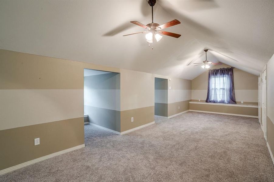 Upstairs primary bedroom with built in seating Upstairs primary bedroom with built in seating