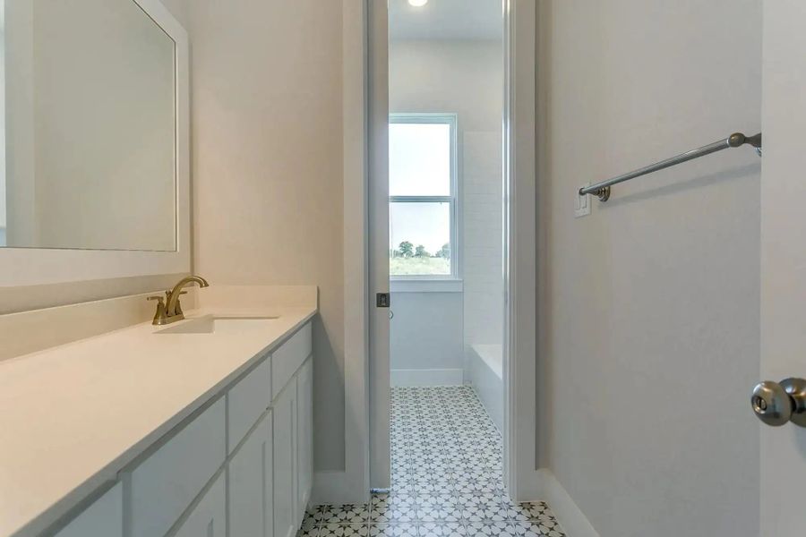 Representative furnished interior of a home built from the The Paxton by Elmwood Custom Homes in Ranch at Stone Hill, Waxahachie (Image 14).