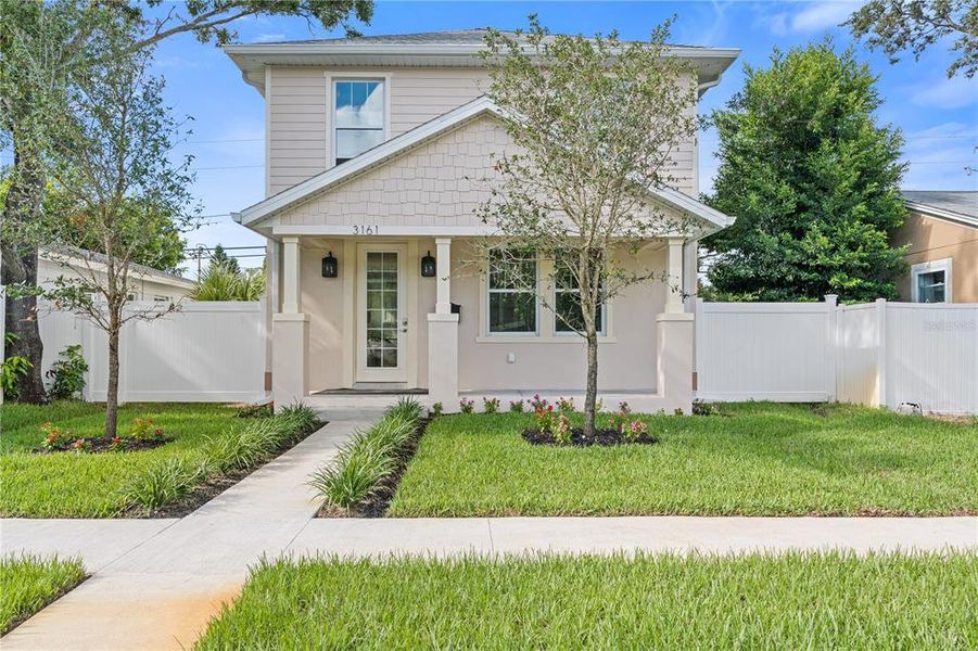 Front exterior of a new home in , St. Petersburg, FL, highlighting curb appeal (Image 14). Front exterior of a new home in , St. Petersburg, FL, highlighting curb appeal (Image 14).