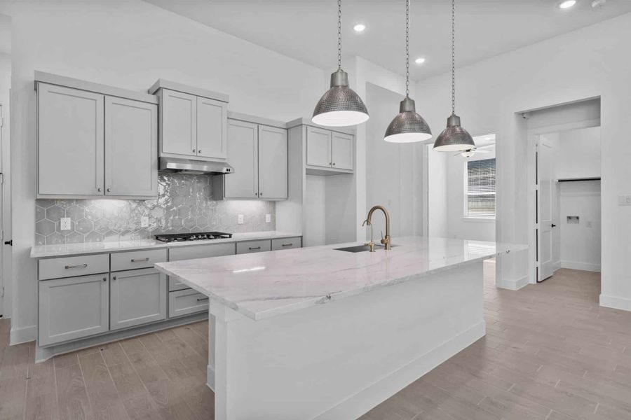 Representative furnished interior of a home built from the Summerton by Chesmar Homes in Grange, Katy (Image 6).