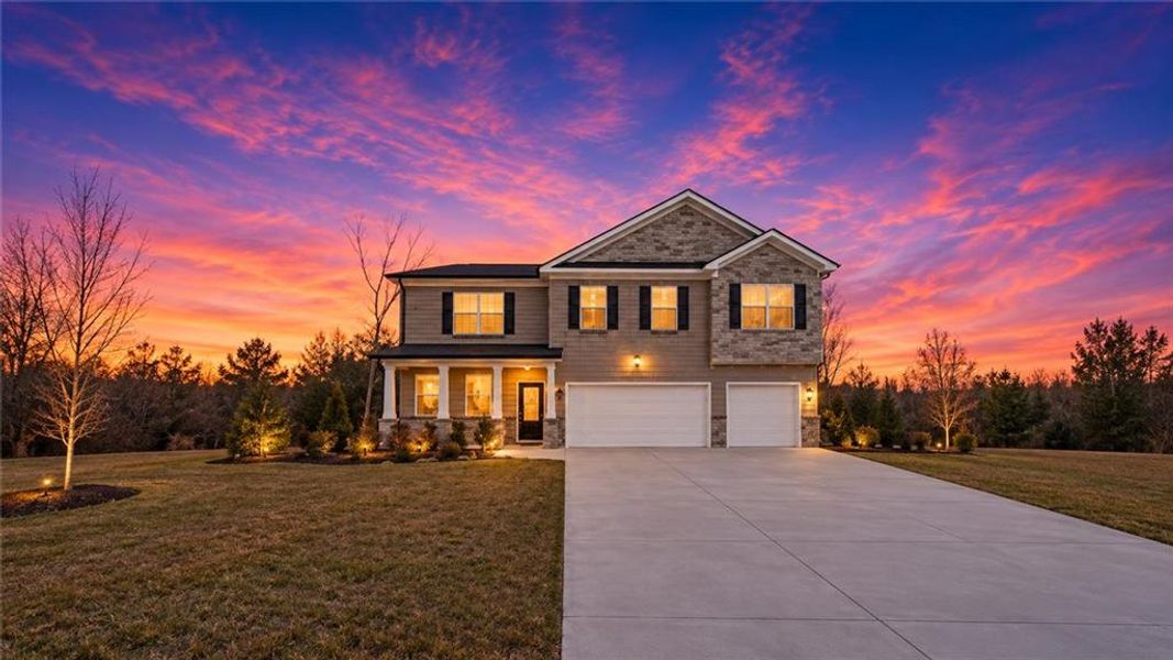 Front exterior of a new home in Independence, Loganville, GA, highlighting curb appeal (Image 25).