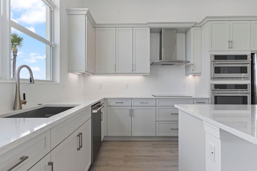 Furnished interior view inside a new home in PGA Village Verano, Port St. Lucie (Image 15).