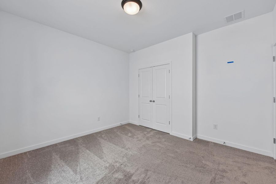 Spacious, unfurnished interior of a new home in Parkton Square, Kyle (Image 32).