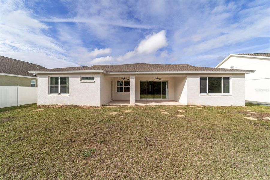 Exterior details and patio area of a home in Calesa Township, Ocala (Image 40).