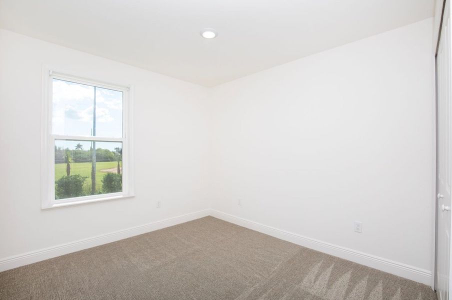 Spacious, unfurnished interior of a new home in Orchid Cove, Bokeelia (Image 6). Spacious, unfurnished interior of a new home in Orchid Cove, Bokeelia (Image 6).