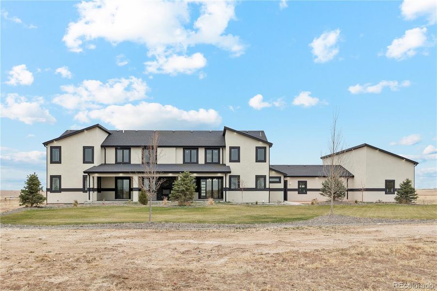 Front exterior of a new home in , Hudson, CO, highlighting curb appeal (Image 26).