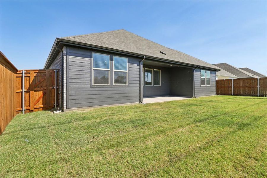 Exterior details and patio area of a home in Lakehaven - Premier Series, Farmersville (Image 19).
