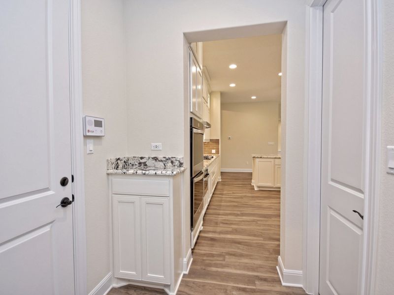 Representative furnished interior of a home built from the San Simeon I by Giddens Homes in Clearwater Ranch, Liberty Hill (Image 226).