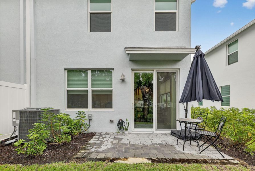Exterior details and patio area of a home in , Stuart (Image 1).