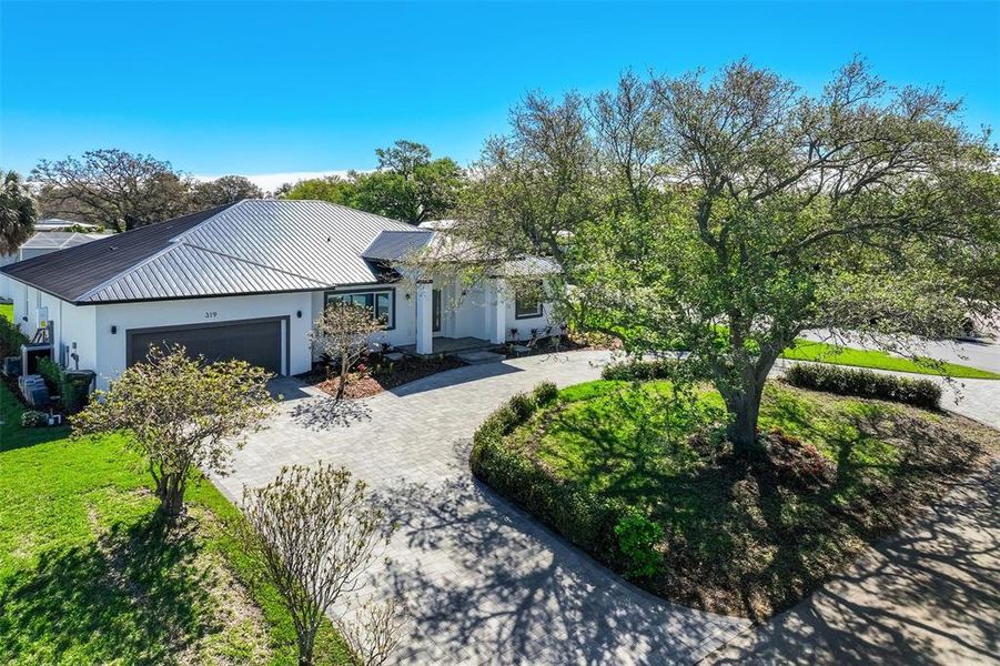 Front exterior of a new home in , Largo, FL, highlighting curb appeal (Image 24).