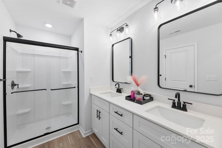 Furnished interior view inside a new home in Surrey Woods, Charlotte (Image 38).