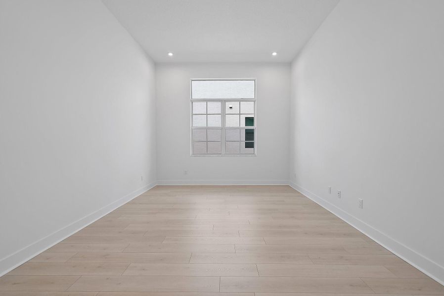 Spacious, unfurnished interior of a new home in L'Ambiance at Avenir, Palm Beach Gardens (Image 30).