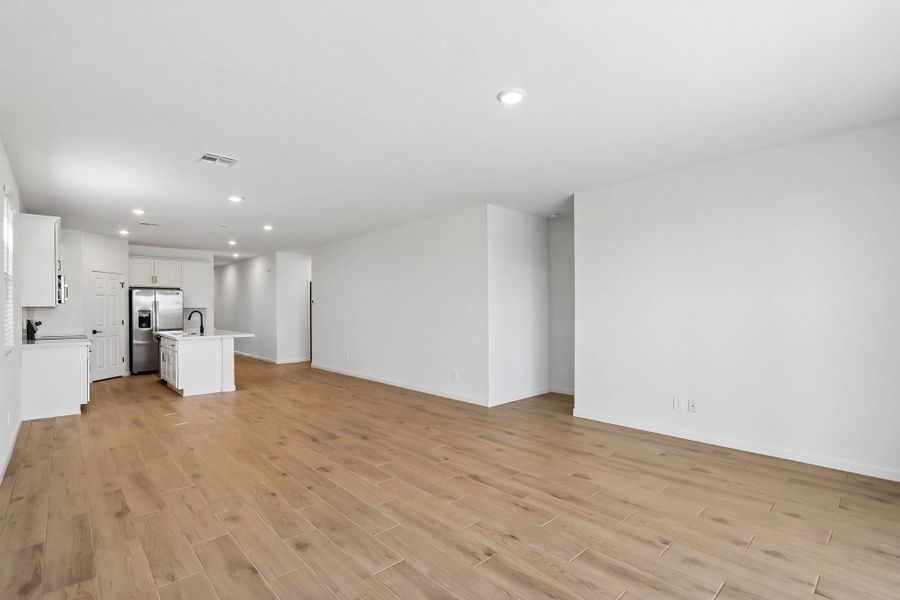 Great room, dining and kitchen Great room, dining and kitchen