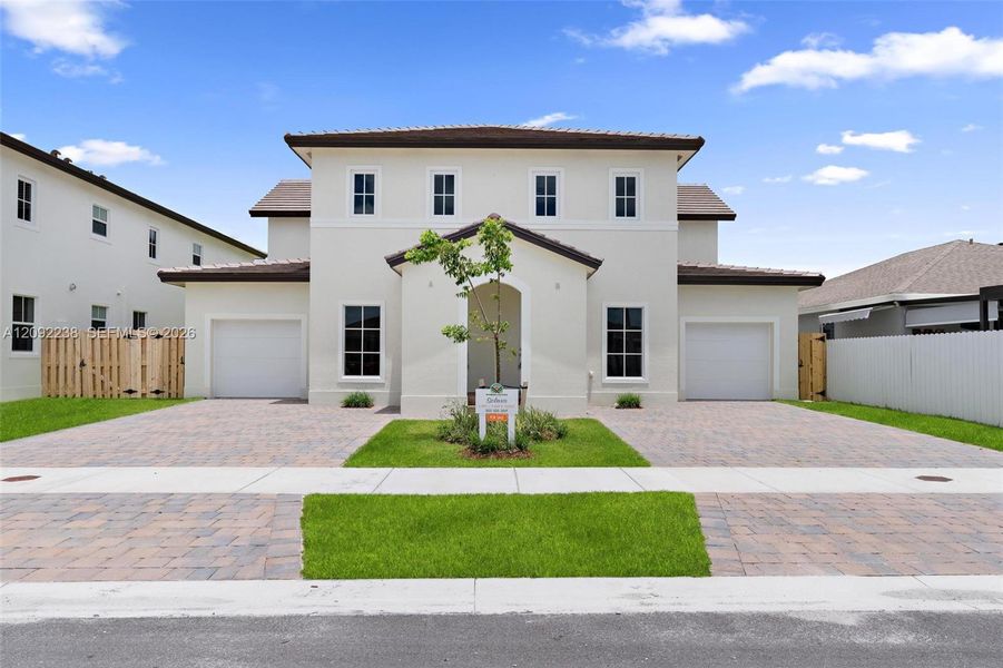 Front exterior of a new home in , Miami, FL, highlighting curb appeal (Image 1). Front exterior of a new home in , Miami, FL, highlighting curb appeal (Image 1).