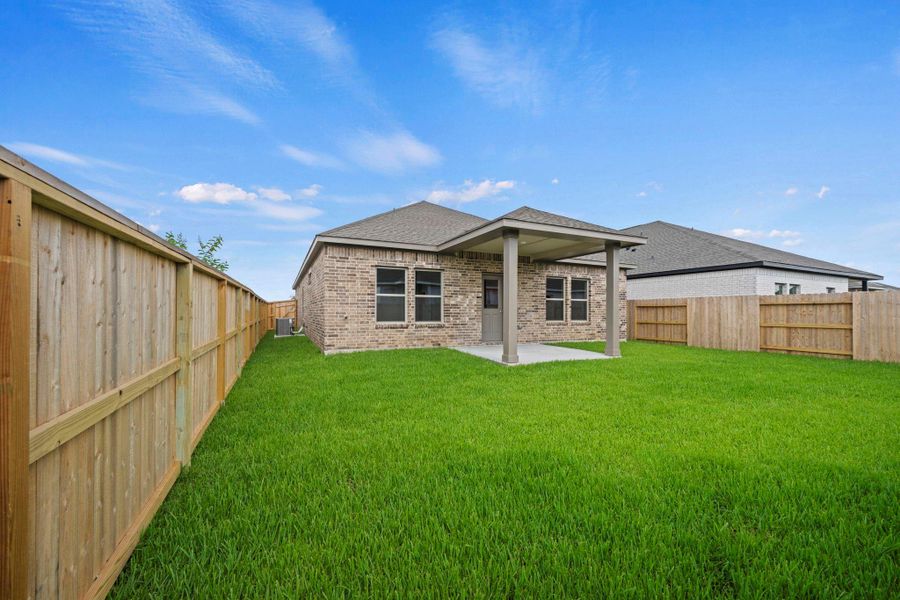 Exterior details and patio area of a home in Windrose Green, Angleton (Image 21). Exterior details and patio area of a home in Windrose Green, Angleton (Image 21).