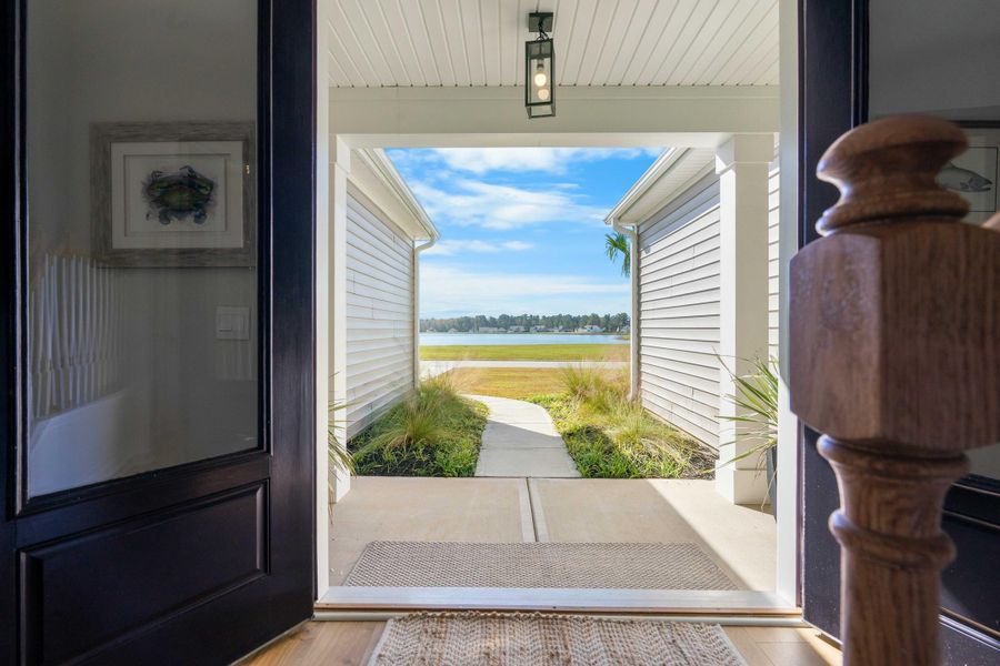 Exterior details and patio area of a home in French Quarter Creek, Huger (Image 30).