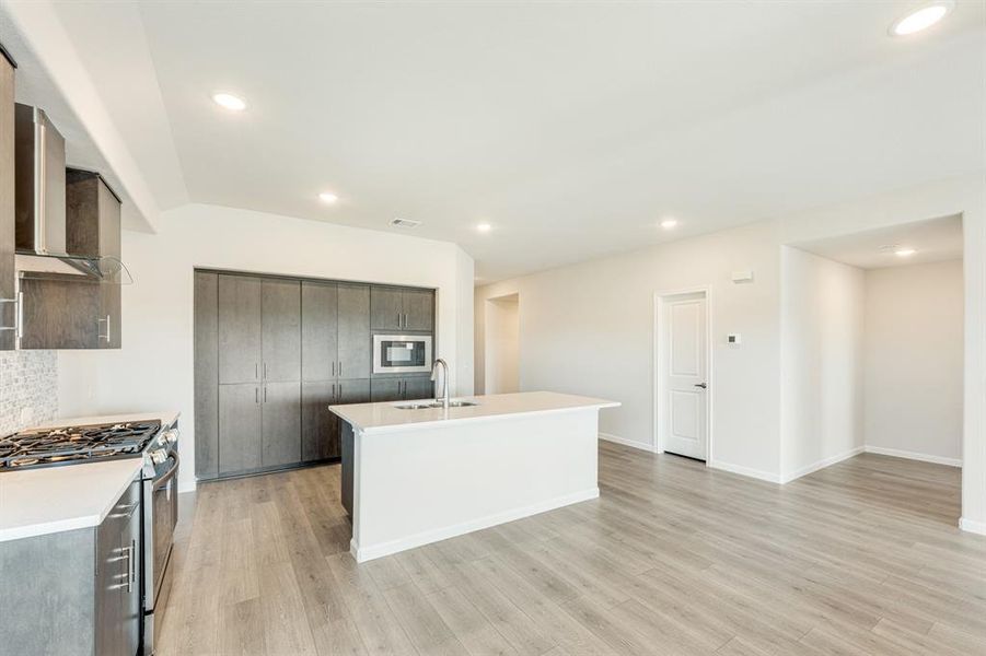 Furnished interior view inside a new home in East Oak Creek Elements, Commerce (Image 12).
