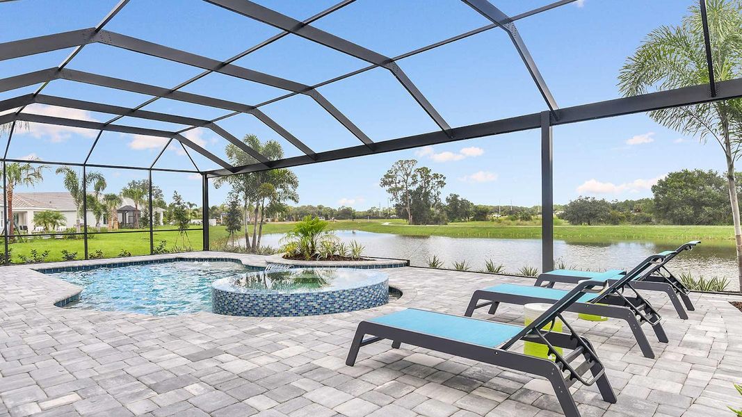 Exterior details and patio area of a home in SkySail Real Estate and Homes for Sale in Naples, FL - Neal Communities, Naples (Image 4).