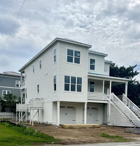 Front exterior of a new home in , Isle Of Palms, SC, highlighting curb appeal (Image 2).