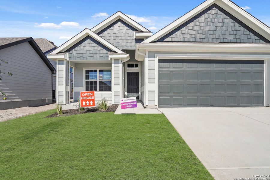 Front exterior of a new home in Swenson Heights, Seguin, TX, highlighting curb appeal (Image 20).