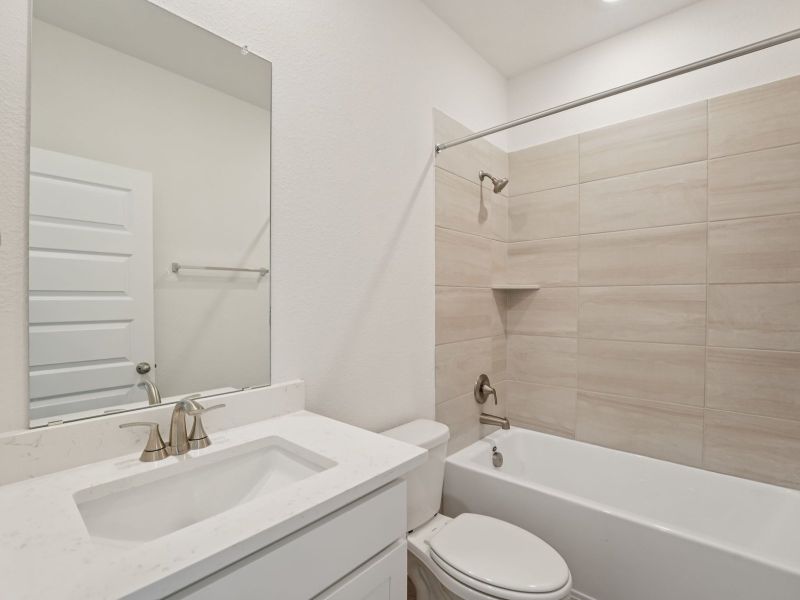 Furnished interior view inside a new home in Prairie Winds - Executive Collection, Hutto (Image 6).