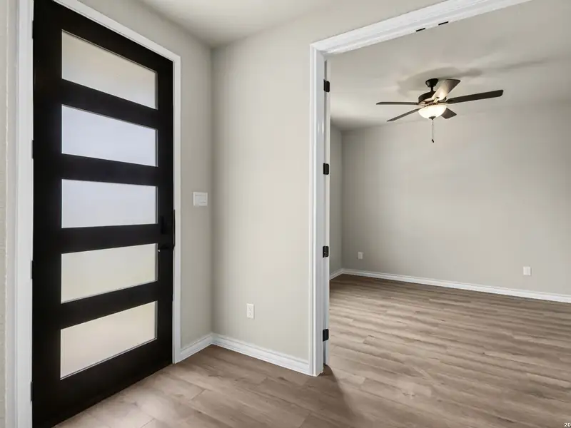 Spacious, unfurnished interior of a new home in The Reserve at Potranco Oaks, Castroville (Image 25).