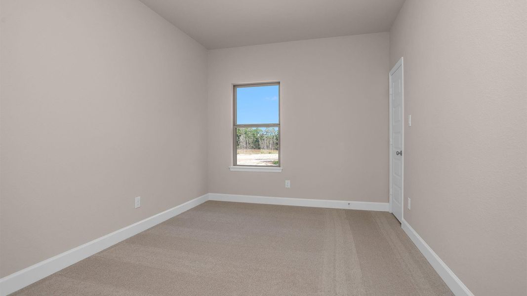 Spacious, unfurnished interior of a new home in The Woodlands Hills 40', Willis (Image 7).