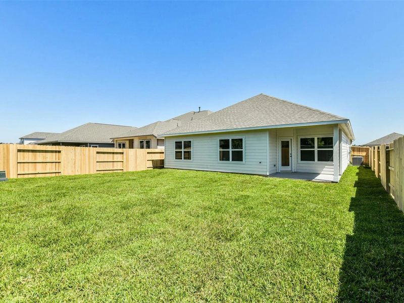 Exterior details and patio area of a home in Sundance Cove, Crosby (Image 4).