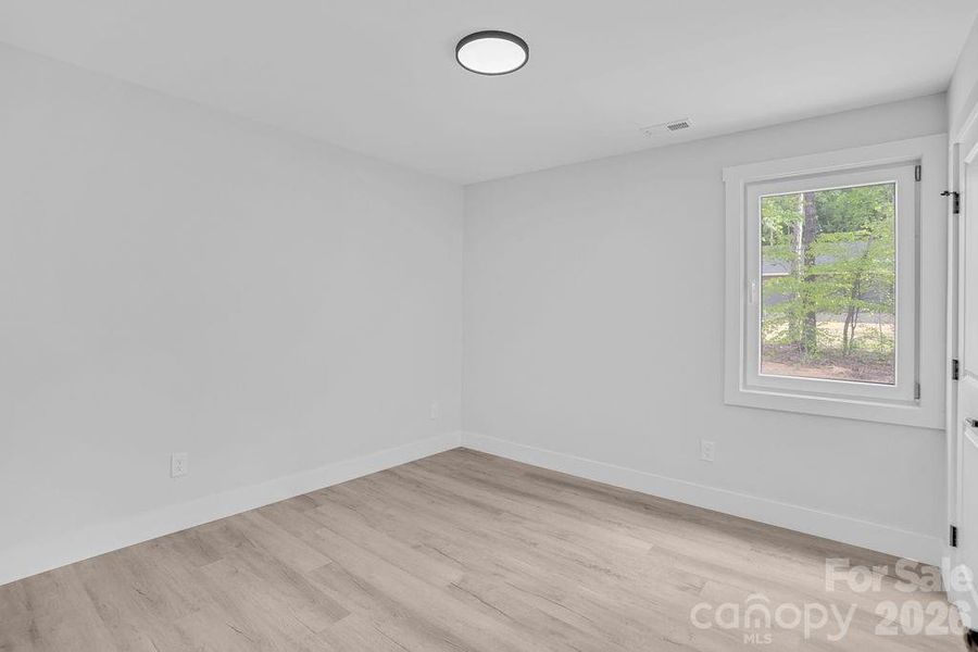 Spacious, unfurnished interior of a new home in , Bessemer City (Image 9).