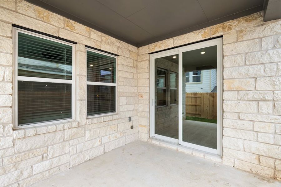 Exterior details and patio area of a home in Union Collection at Park Central, Georgetown (Image 27).
