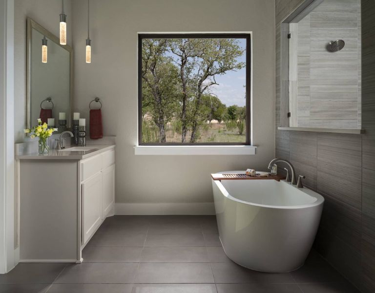 Representative furnished interior of a home built from the Harding 4232 by GFO Home in Bluffview Reserve, Leander (Image 10).