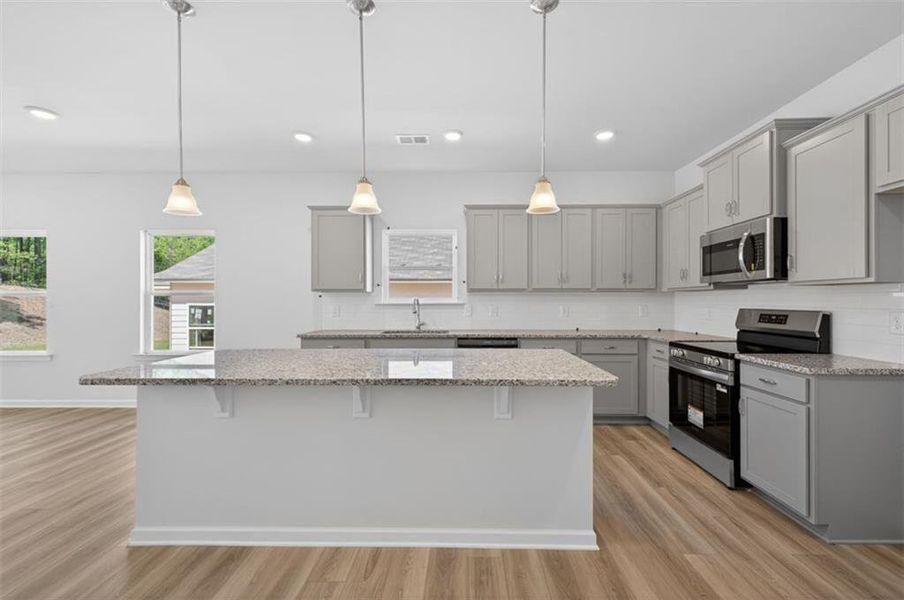 Furnished interior view inside a new home in Summerfield Place, Carrollton (Image 5).