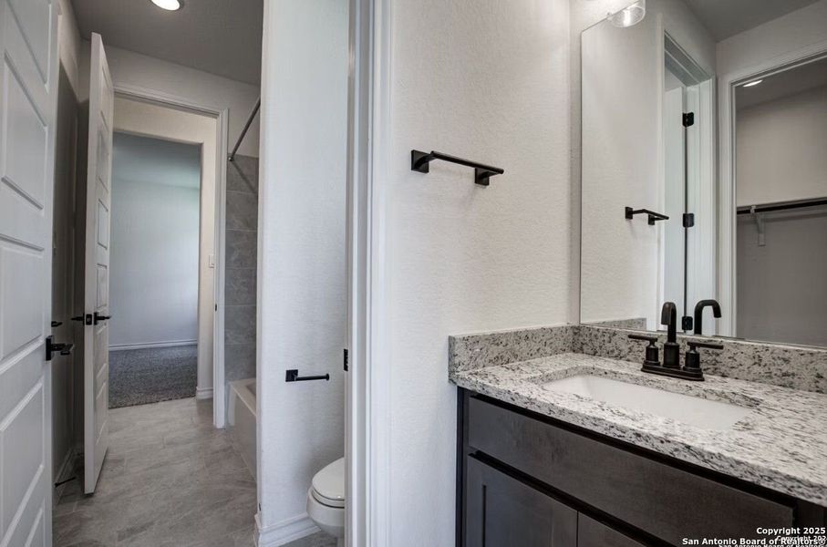 Furnished interior view inside a new home in The Reserve at Potranco Oaks, Castroville (Image 75).