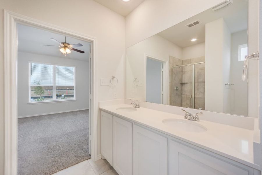 Representative exterior photo of a completed home built from the Joliet by Impression Homes in Heartland, Heartland, TX (Image 22).